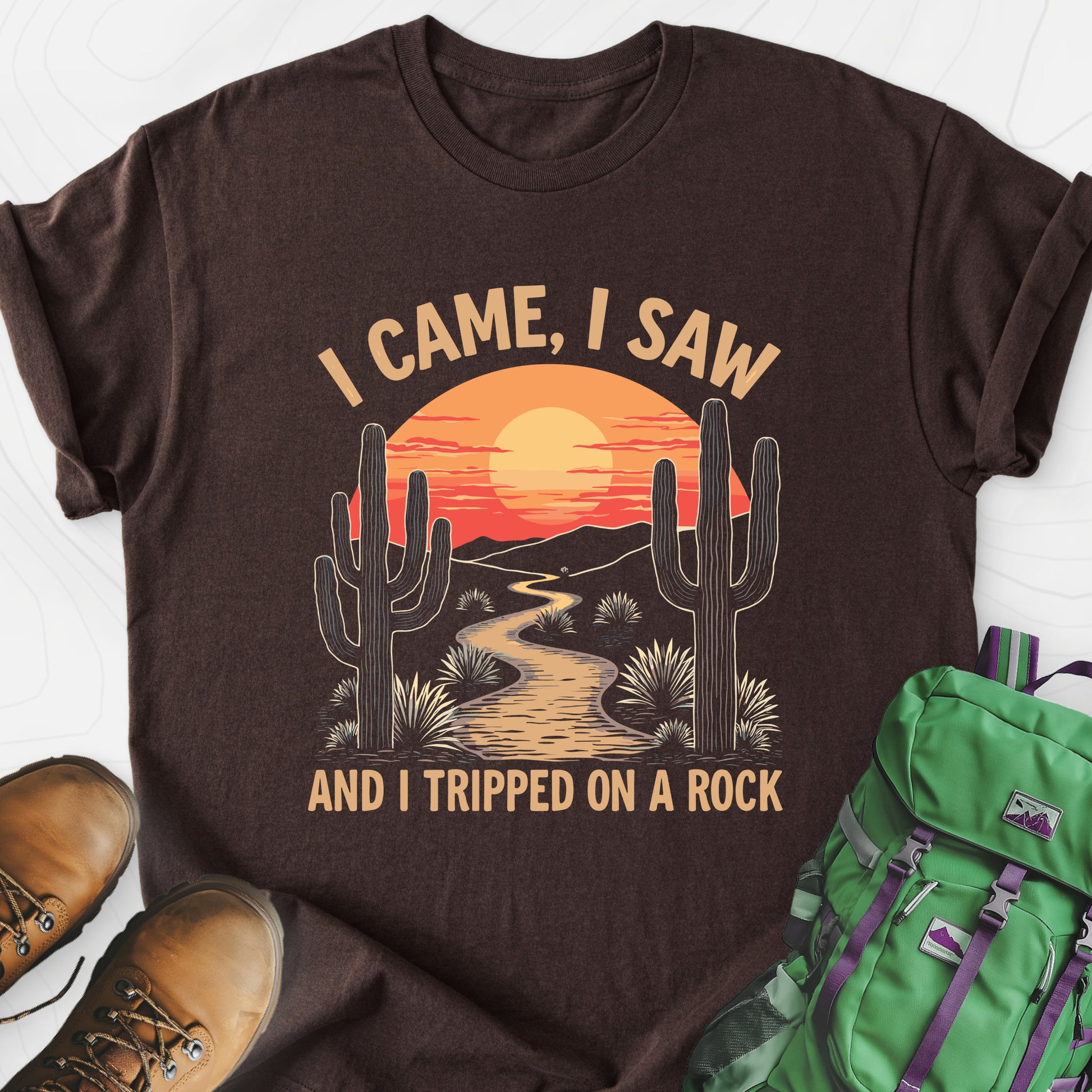 I Came, I Saw, I Tripped On A Rock Dark Chocolate front print lightweight T-shirt