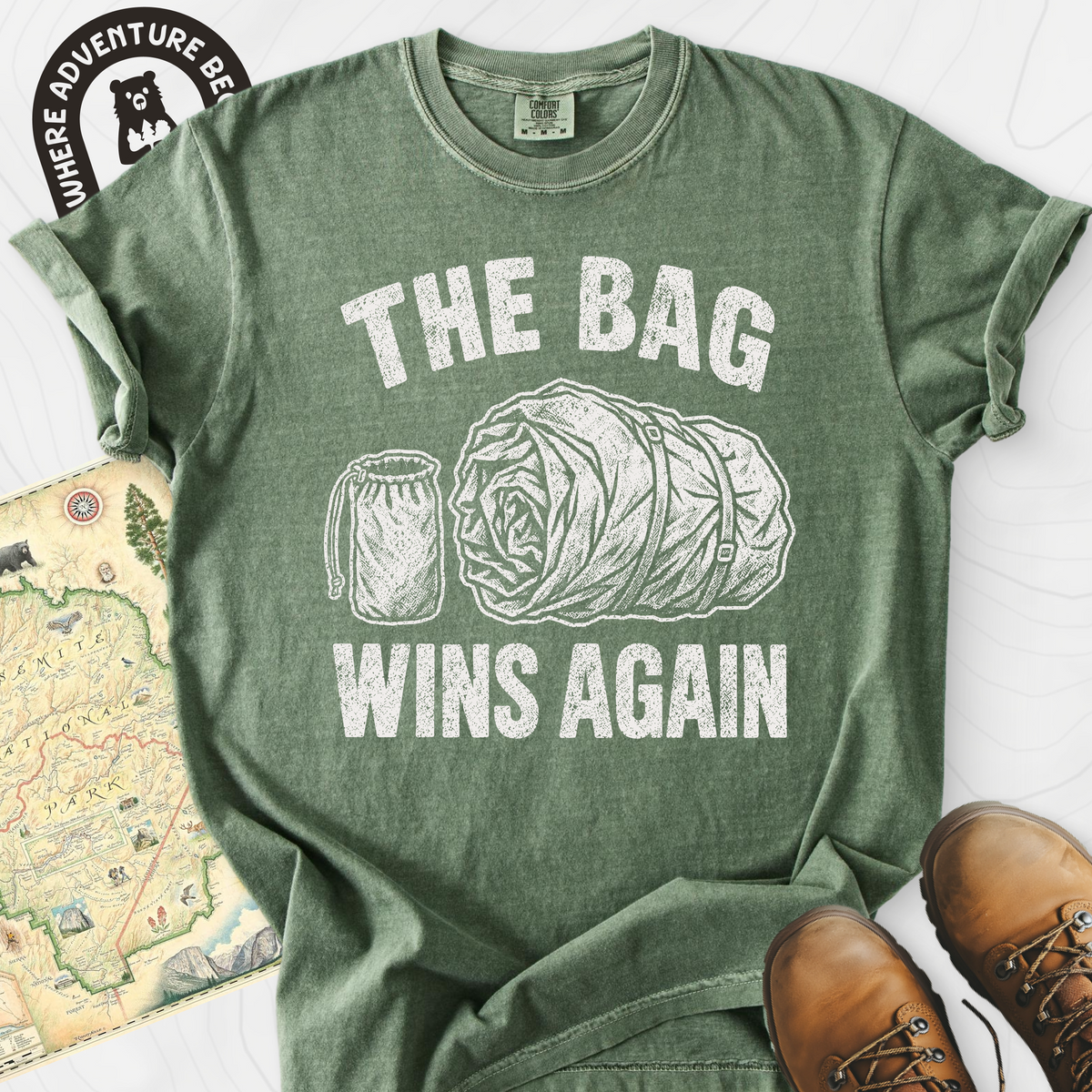 The Bag Wins Again T-Shirt — Moss — Front print [studio:1hKkSZBomVT3Y1lPZ2KwMOgbRyT3tolp1]