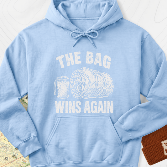 The Bag Wins Again Hoodie — Light Blue — Front print [studio:1aARvoT1muUcwNzR_H9EpYPfs8Ina5SFi]